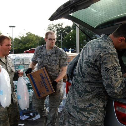 Photo: 120901-A-SM895-018

NEW ORLEANS - Airmen from the Louisiana National Guard's 259th Air Traffic Control Squadron distribute food, water and ice to citizens in need of resources after Hurricane Isaac in New Orleans, Sep. 1, 2012. The LANG has more than 6,000 Soldiers and Airmen on duty to support our citizens, local and state authorities by conducting Hurricane Isaac operations. (U.S. Army photo by Spc. Tarell J. Bilbo, 241st Mobile Public Affairs Detachment/RELEASED) Digital