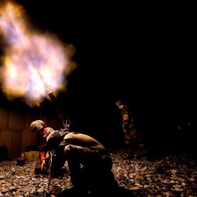 Photo: An 81mm infrared shell is fired into the night by the support section of the French Battle Group Steel during Parabellum Exercise, Sept. 3, 2012. (Photo copyright TF La Fayette)