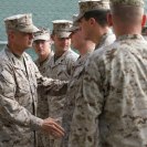 Photo: NATO commander Gen. John Allen shakes hands with fellow Marines before the start of a 9/11 remembrance ceremony at the U.S. Embassy on Sept. 11, 2012 in Kabul, Afghanistan.   (Photo by U.S. State Department) U.S. State Department