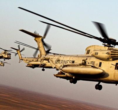 Photo: CH-53D Sea Stallion helicopters fly in formation and complete a memorial flight over Afghanistan's Helmand province.
 The helicopter crews are assigned to Marine Heavy Helicopter Squadron 362. Known as the "Ugly Angels," the squadron will be deactivated later this year after more than 60 years of service. US Marine Corps photo by Corporal Isaac Lamberth.