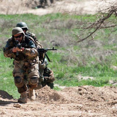 Photo: Afghan Special Forces demonstrate an assault exercise.