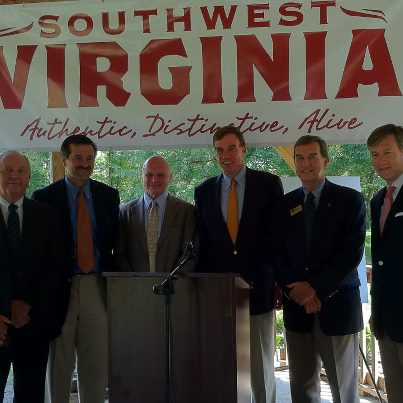 Photo: Acting Assistant Secretary Erskine (far right) and U.S. Senator Mark Warner (third from right) announce the winning “Appalachian Spring – Using Asset-Based and Creative Economy Methods to Catalyze Rural Job Acceleration” Rural Jobs and Innovation Challenge project in Abingdon, Va.  The project will focus on integrating downtown revitalization plans with cultural and natural assets of the region to foster resources for asset growth and job creation.