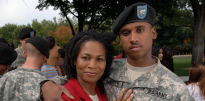 U.S. Army Soldier hugging his mother at graduation