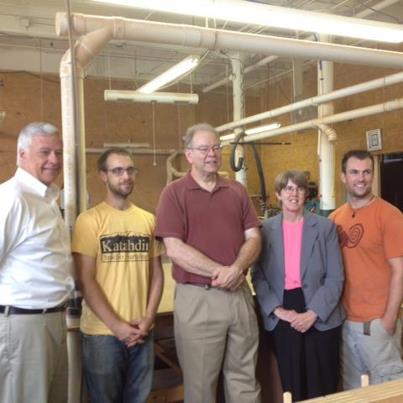 Photo: This afternoon I had a chance to spend time with the team at Kathadin Studio Furniture, a Lewiston based manufacturer that crafts fine wooden furniture.  I would like to thank (from left to right) Steven Anderson, John Stass, Judi Jones, and Caleb Pine for taking the time to share their talents and their story.  I can now see why musicians like Melissa Etheridge are drawn to their products.