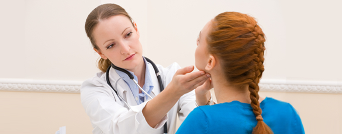 Doctor examining a patient