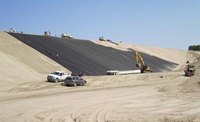 Photo: The Bureau of Reclamation has announced that construction activities related to extensive modifications at Red Willow Dam are progressing at an accelerated rate. The photo shows the placement of geonet beginning at the left end of Red Willow Dam. The contract completion date for Red Willow Dam modifications is currently Nov. 27, 2013. http://on.doi.gov/Q7xqEL