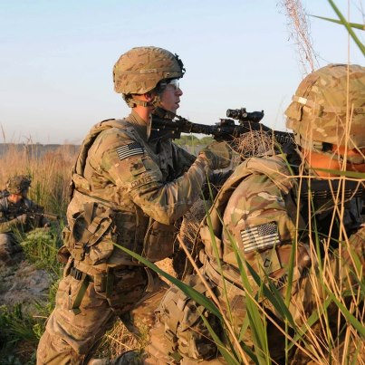 Photo: Soldiers from B Company, 5th Battalion, 20th Infantry Regiment, Fort Lewis, Wash., pull security during Operation Eagle Mountain in Didar, southern Afghanistan, April 13. The operation's purpose was to clear the town of improvised explosive devices and bring U.S. and Afghan presence in the town, thereby providing local Afghans with security. Photo By SGT Marc Loi