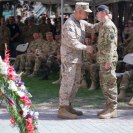 Photo: Marine Gen. John Allen, ISAF commander, embraces Signaller Scott Adams, 18, a rifleman from Dundee, Scotland, serving as a protective mobility driver in Kabul, at the 9/11 memorial ceremony held at ISAF headquarters Sept. 11, 2012.  Adams was 7 years old when terrorists attacked the United States.  “In the United States we refer to our oldest veterans as the Greatest Generation, and they were but I tell you I see before me the new greatest generation,” Allen told the audience.   Photo by Cze-A Frantisek Stein