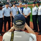 Photo: Airmen from Joint Base McGuire-Dix-Lakhurst pose with Miss New York as a photographer takes a photo of them at MCU Park in Brooklyn, New York City Aug. 21, 2012. The Brooklyn Cyclones hosted a Salute to the Air Force Night as part of Air Force Week 2012. (U.S. Air Force photo by Staff Sgt. Amanda Dick/RELEASED)