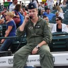 Photo: Capt. Adam Ciarella, 43rd Fighter Squadron F-22 instructor pilot, maintains contact at MCU Park in Brooklyn, New York City with the flyover pilots Aug. 21, 2012. The Brooklyn Cyclones hosted a Salute to the Air Force Night as part of Air Force Week 2012. (U.S. Air Force photo by Staff Sgt. Amanda Dick/RELEASED)