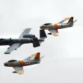 Photo: Air Show

A heritage flight that included two F-86 Sabres flanking an A-10 Thunderbolt II demonstrated the proud heritage of military aviation over the past 60 years at Offutt Air Force Base, Neb., Aug. 24, 2012. The 2012 Defenders of Freedom Open House and Air Show included this and many other aerial demonstrations as well as ground shows and static aircraft displays. (U.S. Air Force photo by Josh Plueger)