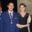 Photo: Senior Airman Andrew Merrylees, 142nd Airlift Squadron, 166th Airlift Wing, Delaware Air National Guard, with his wife on Aug. 16, 2012 after he received the Distinguished Graduate award at the conclusion of the in-residence Airman Leadership School held from July to August at Dover Air Force Base, Del. (courtesy photo)