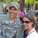 Photo: Sgt. Justin Arrington, 2010 USACAPOC(A) Soldier of the Year poses with family after completing the two-month long U.S. Army Ranger School.