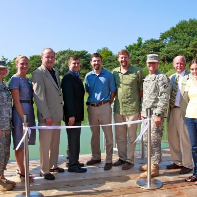 Photo: The Army Corps of Engineers team was pleased to participate in a ribbon cutting ceremony on September 4th for the Aquatic Ecosystem Restoration Project at the Chicago Botanic Garden’s North Lake. In his remarks, Chicago District Commander Col. Frederic A. Drummond, Jr. commended all of the federal, state, local and private partners involved in completing the project, adding that “this project is an excellent example of innovative technologies that restore, maintain and protect our natural areas. And it provides a unique opportunity for the public to view first-hand how these environmental improvements are constructed and maintained.” 

More than 120,000 native plants and shrubs were used to stabilize shoreline soils—some with roots more than six feet deep. Stones and boulders, along with specialized plastic mesh and webbing materials, also help stabilize the shoreline’s edge and protect newly-installed aquatic plantings. Additional information about the project is available at www.lrc.usace.army.mil.