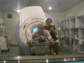 Photo of Sook-Lei Liew and R.J. Andrews in the MR scanner room at Peking University First Hospital.