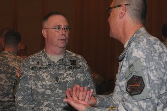 Maj. Gen. Donald L. Rutherford, Chief of Chaplains, speaks with one of the chaplains attending the Chaplain Annual Sustainment Training-Europe in Germany, Sept. 14. The CAST-E is a week-long event designed to conduct professional development training and provide relevant and ready ministry teams in support of future pastoral operations.