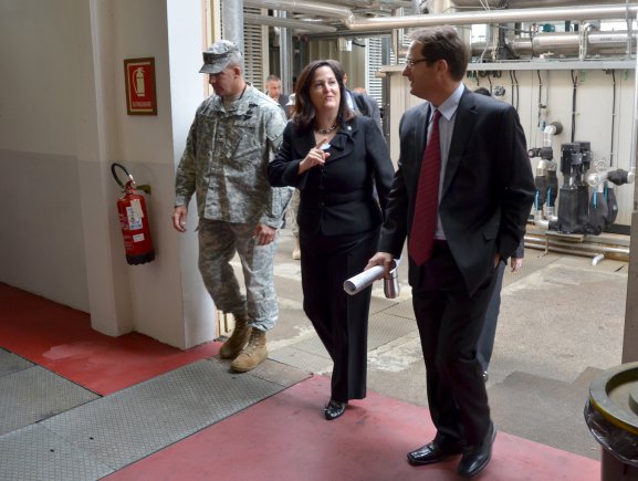 Assistant Secretary of the Army for Installations, Energy and Environment Katherine Hammack (center) tours the Vicenza, Italy, co-generation plant with Col. David Buckingham, USAG Vicenza commander, and Greg Vallery, chief Engineering Division, USAG Vicenza Directorate of Public Works, during her visit to Italy, Sept. 13, 2012.