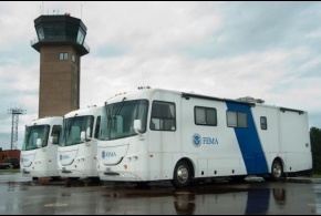 Mobile Communications Office Vehicles stage at an Incident Support Base.