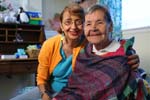 On March 18, 2008, Senior Companion Amelia Baldini spends time with client Maria Luisa Aranda in her home in San Antonio, Texas.
