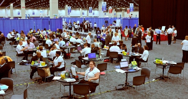 Hiring fair workers at tables