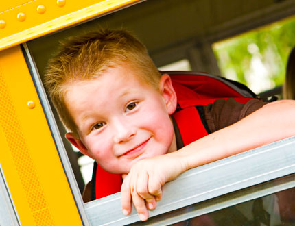 Boy in a schoolbus