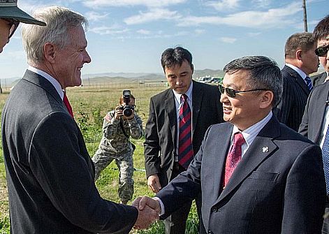 Secretary of the Navy (SECNAV) the Honorable Ray Mabus meets with Z. Enkhbold, speaker of the Mongolian Parliament, during the Khaan Quest 2012 (KQ12) closing ceremony at the Mongolian Armed Forces Peace Support Center near Ulaanbaatar, Mongolia. Mabus visited Mongolia to observe multilateral training exercises and to meet with senior U.S. and Mongolia government and military officials to discuss strengthening bi-lateral partnerships and global peacekeeping operations.  U.S. Navy photo by Chief Mass Communication Specialist Sam Shavers (Released)  120824-N-AC887-002