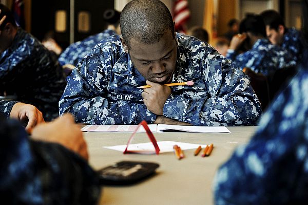 Aviation Administrationman 3rd Class Travis Clay, assigned to the aircraft carrier USS Nimitz (CVN 68), takes the Navy-wide advancement exam at the Commons at Naval Station Everett, Wash. Nimitz is currently docked at Naval Station Everett for a carrier in-port availability.  U.S. Navy photo by Mass Communication Specialist 2nd Class Robert Winn (Released)  120913-N-HN953-018