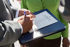 Speaker John Boehner signs a program following the Congressional 9-11 Remembrance Ceremony. September 11, 2012. (Official Photo by Bryant Avondoglio)

--
This official Speaker of the House photograph is being made available only for publication by news organizations and/or for personal use printing by the subject(s) of the photograph. The photograph may not be manipulated in any way and may not be used in commercial or political materials, advertisements, emails, products, promotions that in any way suggests approval or endorsement of the Speaker of the House or any Member of Congress.