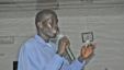 A member of the audience asking a question of the panel at VOA’s Town Hall meeting in Juba, South Sudan, September 14, 2012. (Mugume Davis Rwakaringi/VOA)