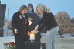 Mothers remember fallen at post candlelight vigil 