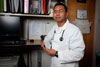 A Physician Assistant holds a clipboard