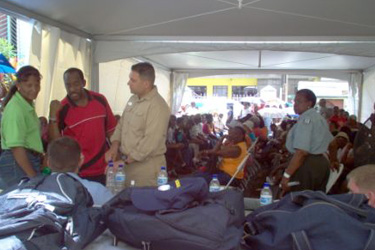 The crowd of patients in Port of Spain at the Moultan Hall Methodist School waiting for treatment was so large that local police were brought in to help control the crowds.