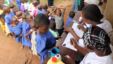 Primary school children line up for trachoma medicine in Buniantole, eastern Uganda. September 12, 2012. (Hilary Heuler/VOA)