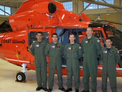 Dr .Salvon-Harman (middle) with his helicopter crew at Air Station Port Angeles following a winter storm medevac.