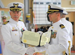Captain Jeff Salvon-Harman accepting an award