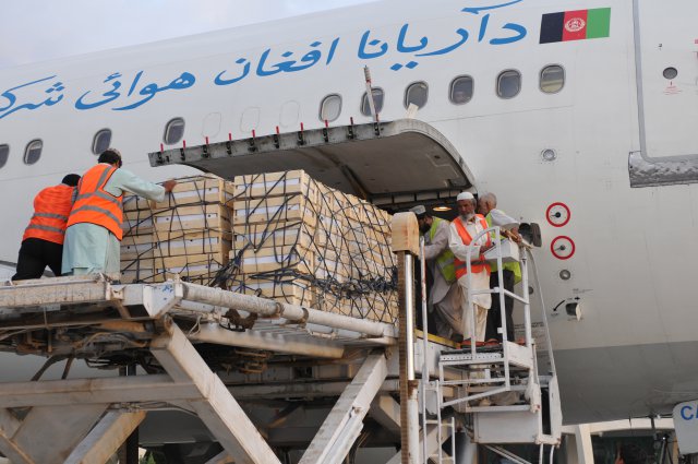 A pallet of sweet melons from Spin Boldak, Afghanistan, is loaded into the forward cargo hold of an Ariana Afghan Airlines jet at Kandahar International Airport, Sept. 8, 2012. The pallet is one of two being flown to Dubai where they are considered a premium fruit.