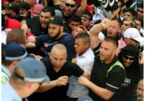 Image: Protesters clash with police in Sydney on Saturday as a wave of unrest against a film that mocks Islam spread to Australia (© Greg Wood/AFP/Getty Images)