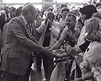 President Gerald Ford shakes hands with NIH staff, patients, and guests at the Clinical Center.