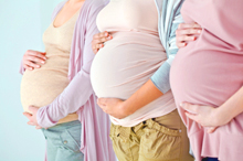 Photo of 3 pregnant women.