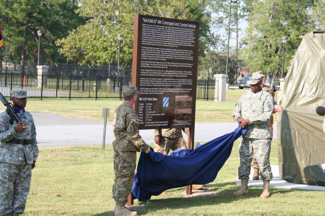 The Third Infantry Division Commander Maj. Gen. Robert "Abe" Abrams, left, assists the Vice Chief of Staff of the Army Gen. Lloyd J. Austin III in unveiling the Army's last M4 Command and Control Vehicle, "Maximus," in a dedication ceremony, July 24, 2012, at Fort Stewart, Ga.  Austin, while the Third ID Assistant Division Commander (Maneuver) used "Maximus" to help spearhead the Division's push into Iraq in 2003.