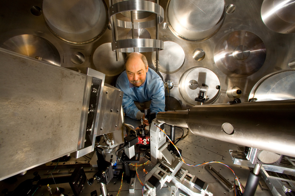 Tom Hurry of Plasma Physics adjusts the target positioner and particle beam diagnostics prior to an experiment at Trident.