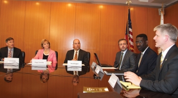 USPTO leadership looks on as Judge Michael Tierney of the Board of Patent Appeals and Interferences addresses Friday’s webinar on changes to patent laws.