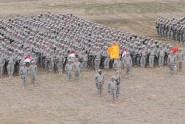 Soldiers from 53rd Infantry Brigade Combat Team stand in formation during a departure ceremony at Ft. Hood, Texas, Feb. 25, 2010. The Florida Army National Guard Soldiers departed by plane from Ft. Hood in late-February and early-March for missions in Kuwait and Iraq. Photo by Spc. Spenser Rhodes