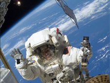 Mission Specialist Steve Bowen performs a spacewalk