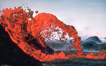 Arching lava fountain erupting at Kilauea Volcano, Hawai`i