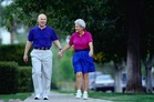 Photo of a couple walking. - Click to enlarge in new window.