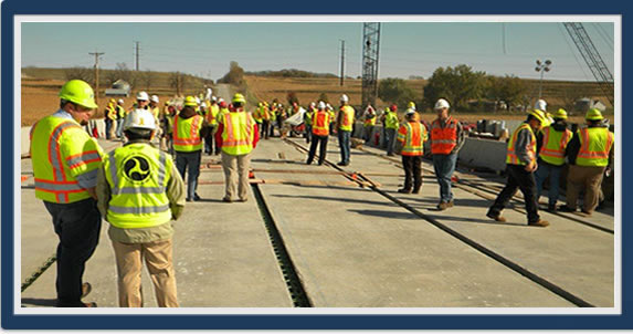 Iowa DOT held a showcase event for its $2.7 million Keg Creek Bridge on US 6 in Pottawattamie County. The bridge was completely prefabricated in separate components in a field next to the bridge site.