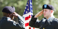 Army soldiers saluting each other