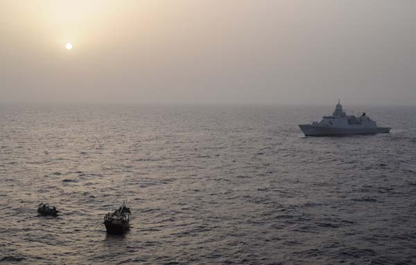 HNLMS Evertsen in background with dhow in the foreground