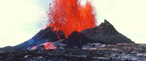 View of red hot lava erupting from a volcano